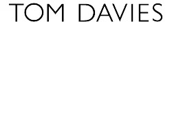 Image of Tom Davies brand logo. White background with black letters spelling brand in all caps.